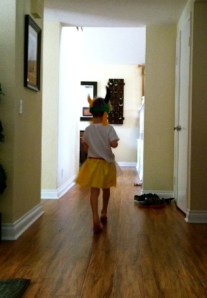 On his way upstairs to pack for the trip to see his new cousin.