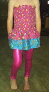 C.J. and Nana started with  Mock Smock fabric that comes smocked at the top and pre-finished at the top and bottom.  C.J. paired it with pink glitter spandex leggings.